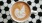 a cup of coffee on a table