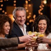 a group of people having drinks together