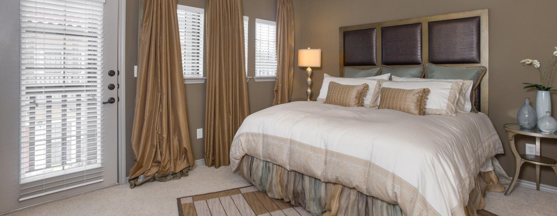 a bedroom with a large bed